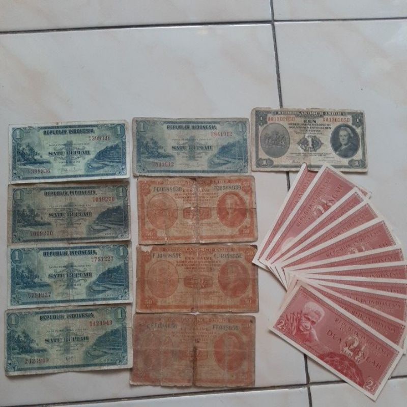 Paket Uang Kuno NICA 50 Cents 1 Gulden 1943 1 Rupiah 1953 Pemandangan 2 1/2 Rupiah suku bangsa.
