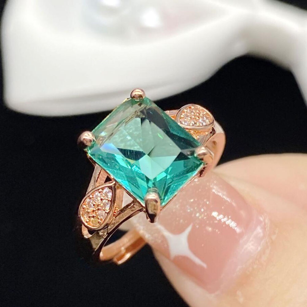 Cincin Kristal Berlian Emerald Rose Gold Bahan Stainless Steel Untuk Wanita