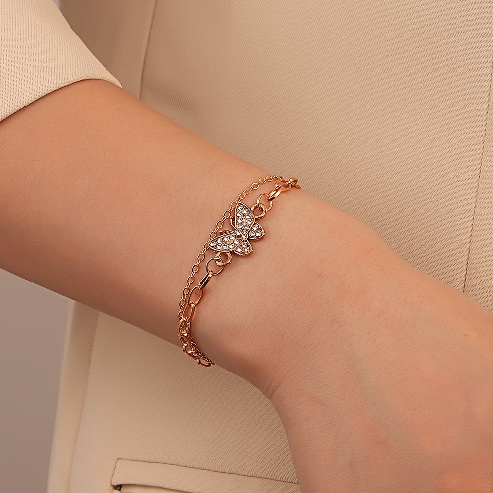 Gelang Tangan Rantai Metal Tipis Ringan Desain Kupu-Kupu Hias Berlian Metalik Untuk Wanita