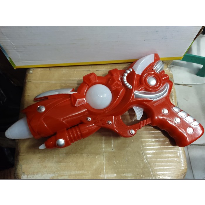 Mainan Pistol Lampu Musik