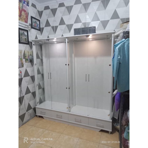 lemari kaca untuk gamis
