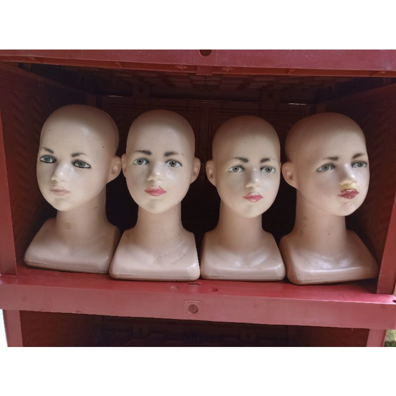 patung kepala manekin bekas pakai