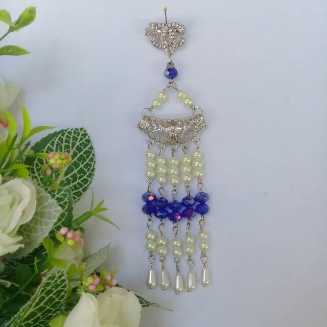 Bros dagu bulan sabit juntai