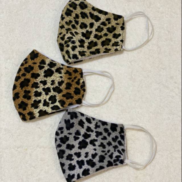 Masker kain corak macan