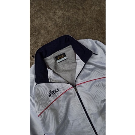 jaket windbreaker asics