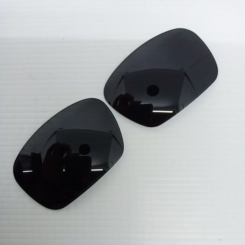 Oakley badman stealth black polarized lens