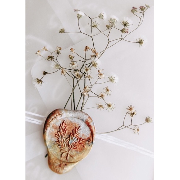 

wax seal with dried flower