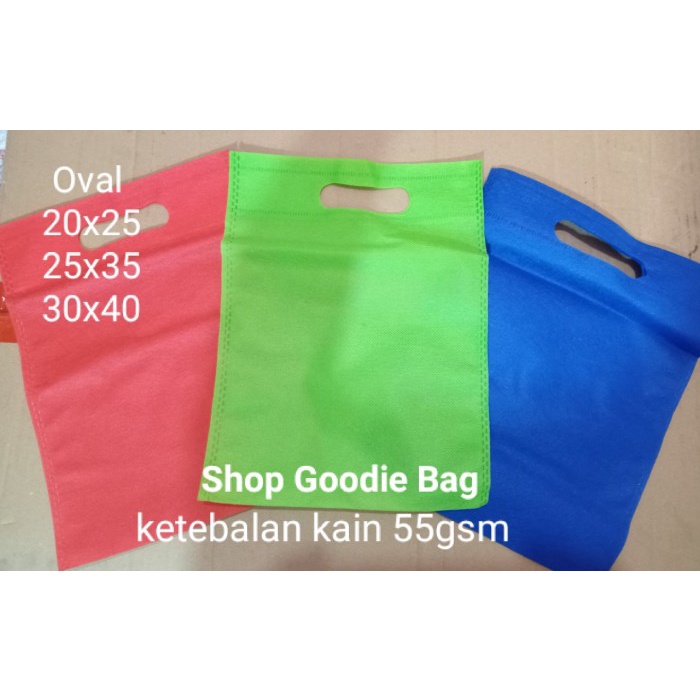 

PROMO Goodie Bag Oval uk 20x25 bahan tipis 55gsm / tas spunbond polos - Merah