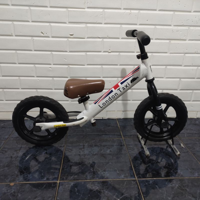 preloved push bike balance bike london taxi second