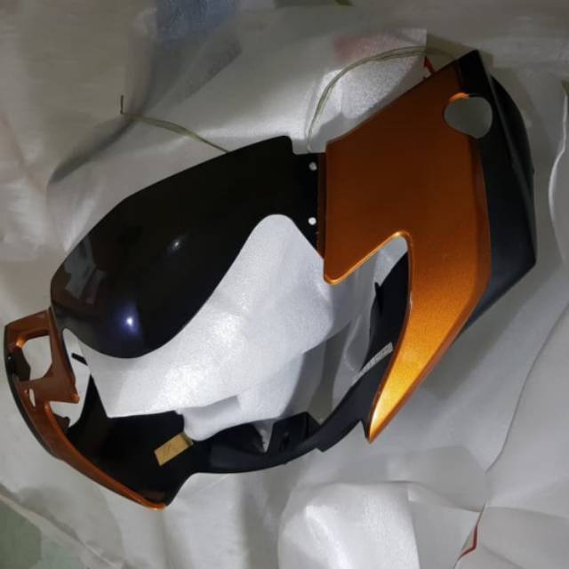 COVER BATOK LAMPU DEPAN SUPRA X125 FI COKLAT