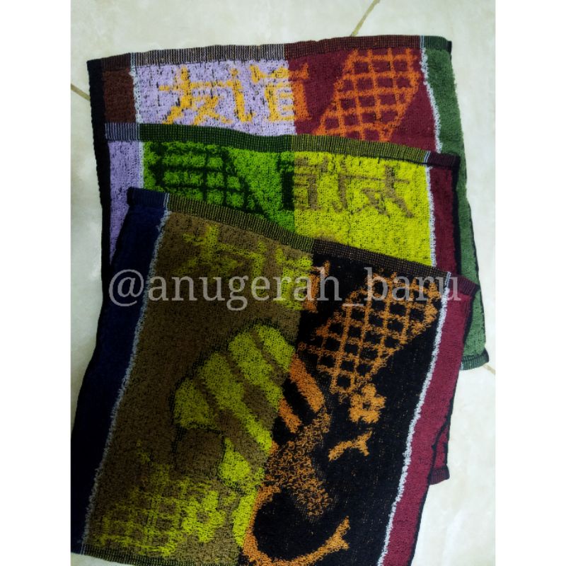 sapu tangan handuk motif