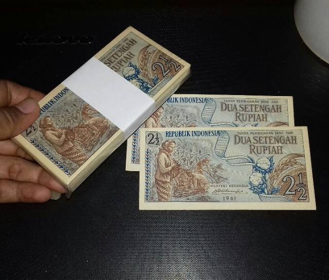 (GRESS/AU/UNC) Uang kuno 2 setengah rupiah sandang pangan tahun 1961 gambar jagung dan padi