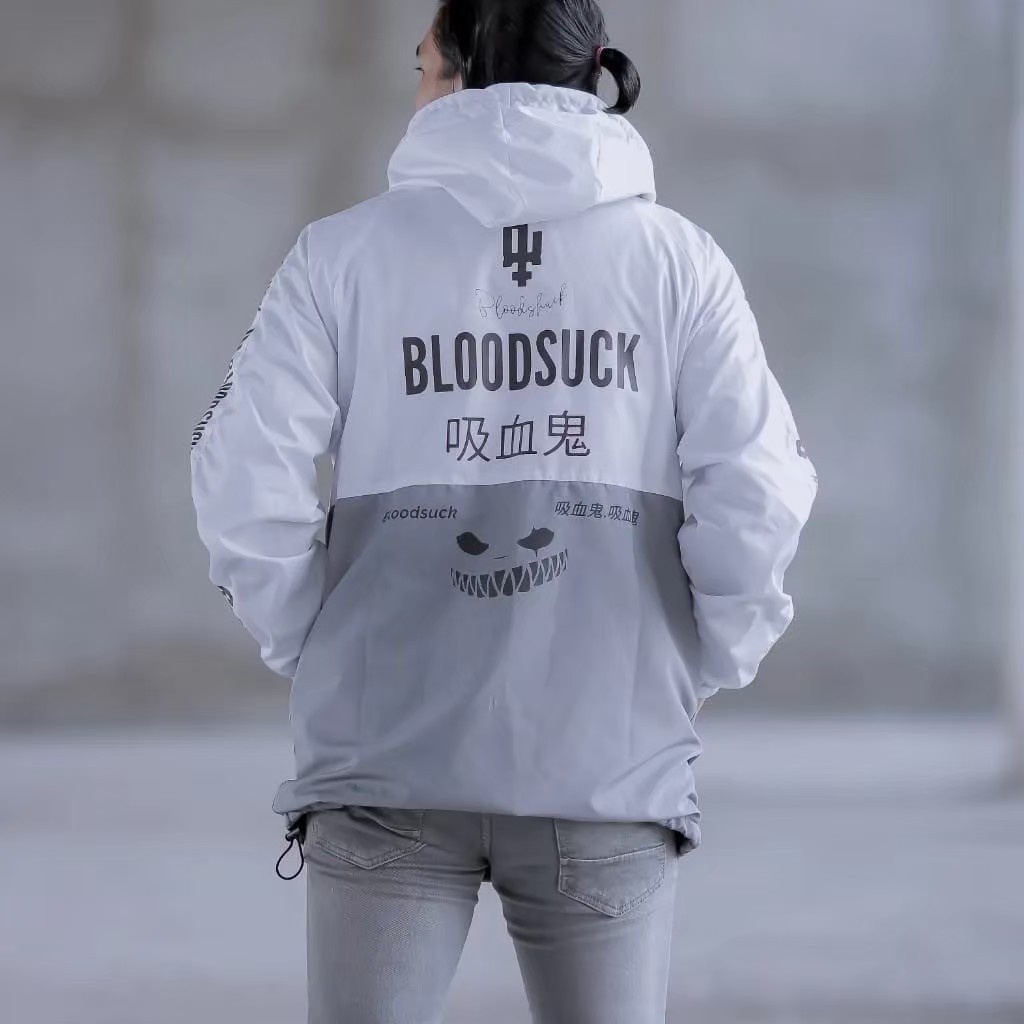 JAKET PRIA CAGOULE PARASUT WATERPROFF KANTONG DORAEMON