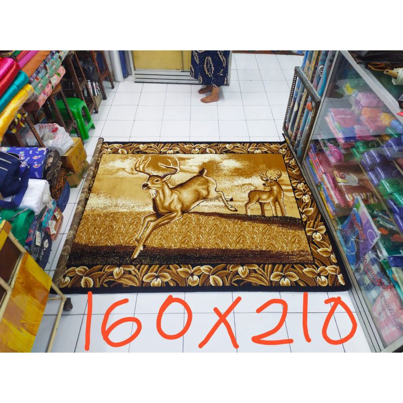 Karpet permadani motif hewan