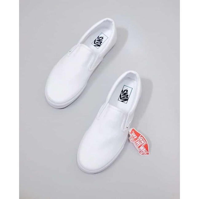 slide on vans white
