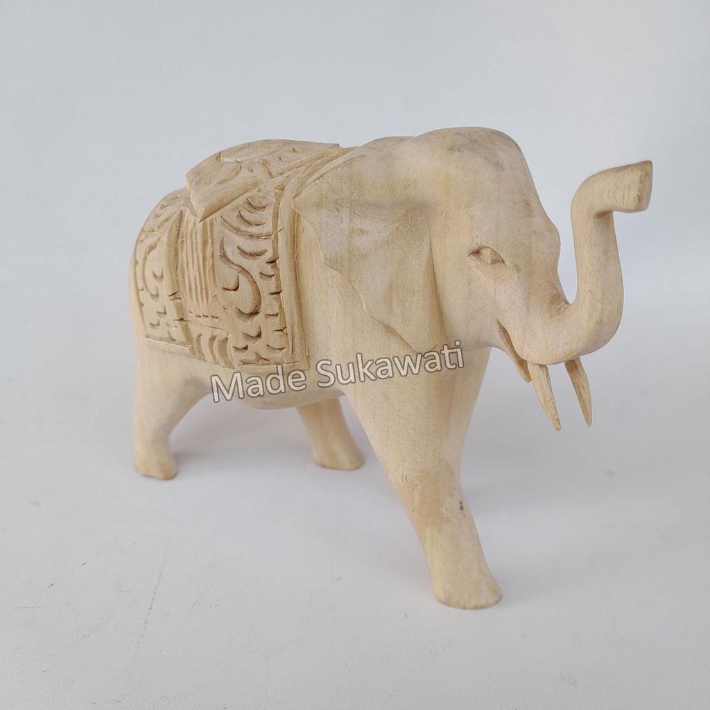 Patung kayu gajah berjalan punggung ukir kerajinan handmade ukiran tangan bali