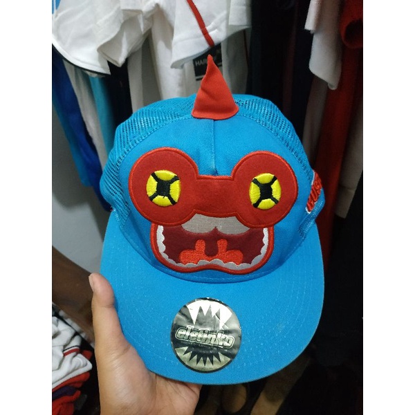 topi elstinko dewasa