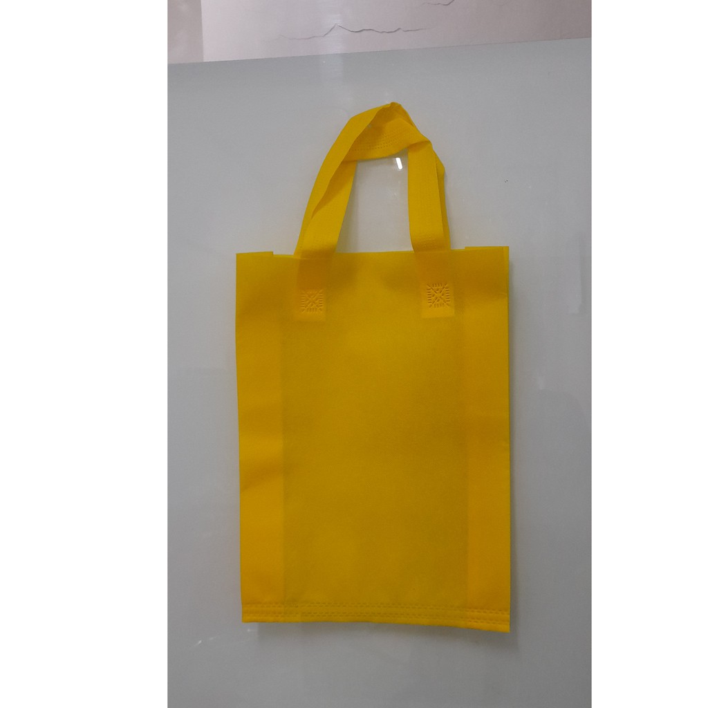

(Lusin) Tas Press Spunbound Tali Goodie Bag Tas Belanja Warna Kuning 25 cm x 35 cm