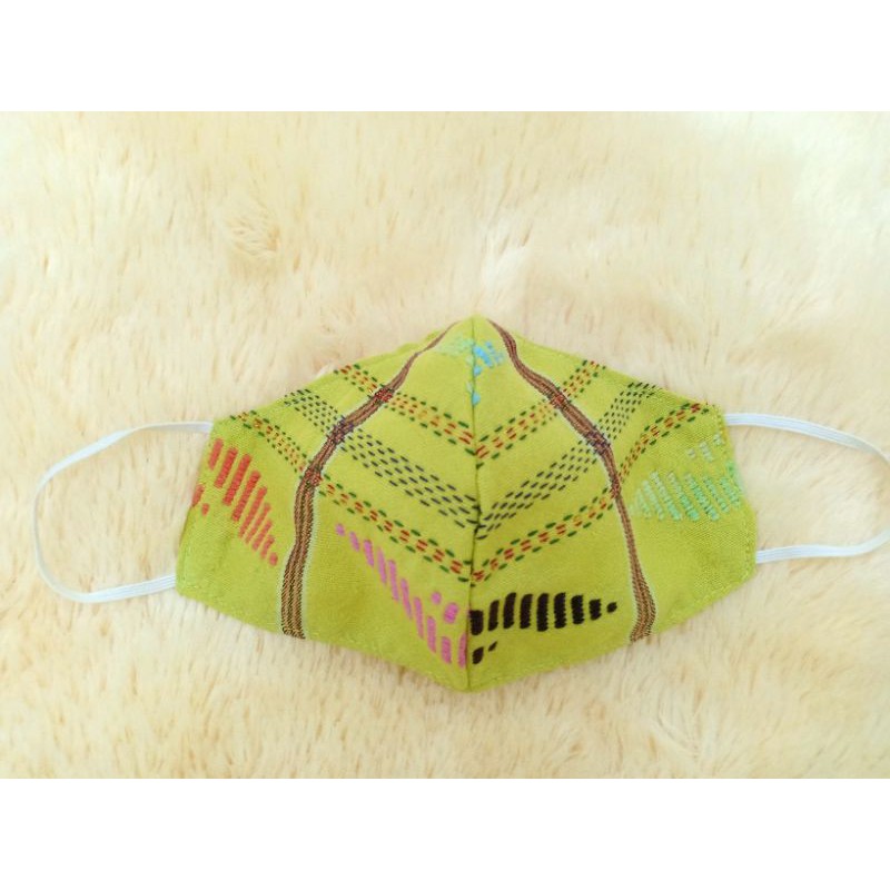 

Masker Ulos hijau stabilo