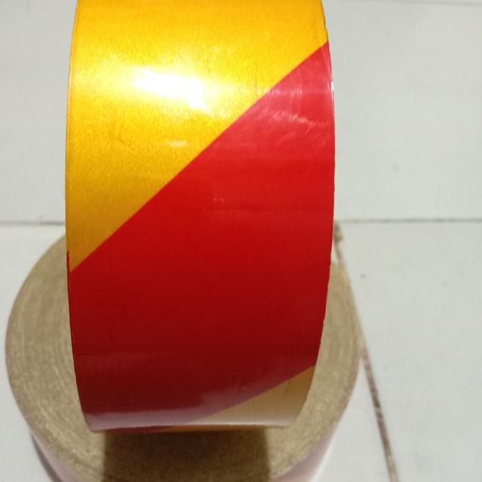 

STIKER REFLEKTIVE Kuning Merah/ STICKER TAPE 5 CM X 5 METER zahrelectrical