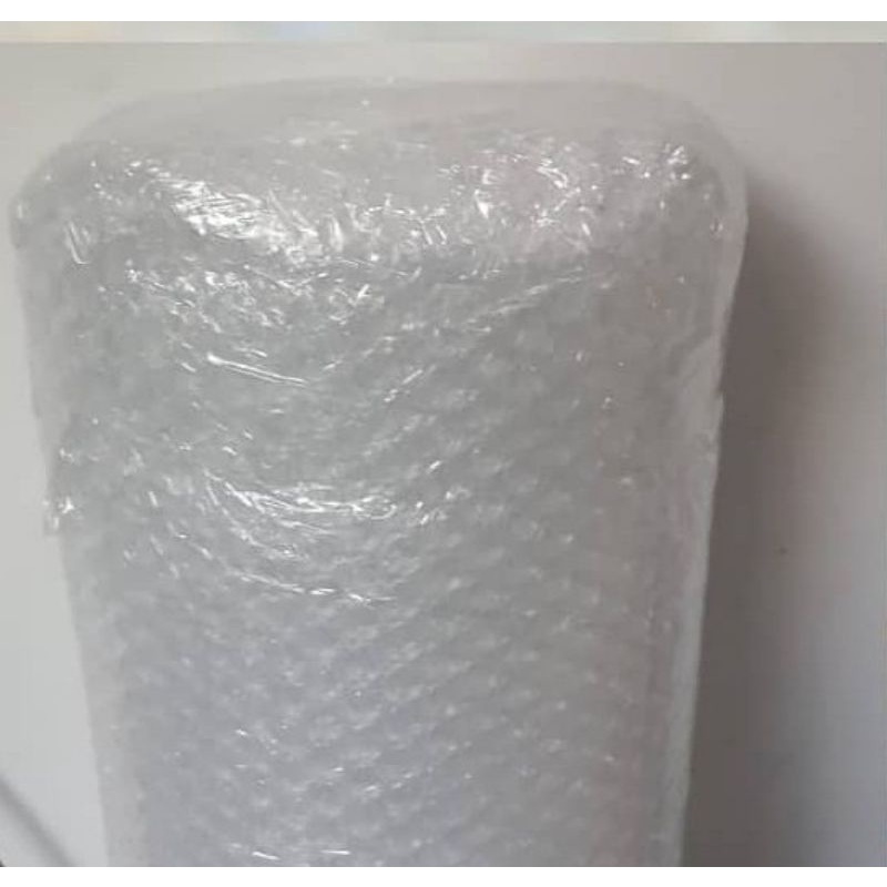 

Packing Bubble wrap +kardus+triplek (Untuk Frame Kaca)
