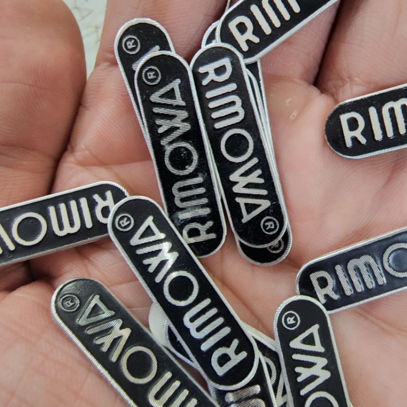 Logo Rimowa Koper Plat Logo