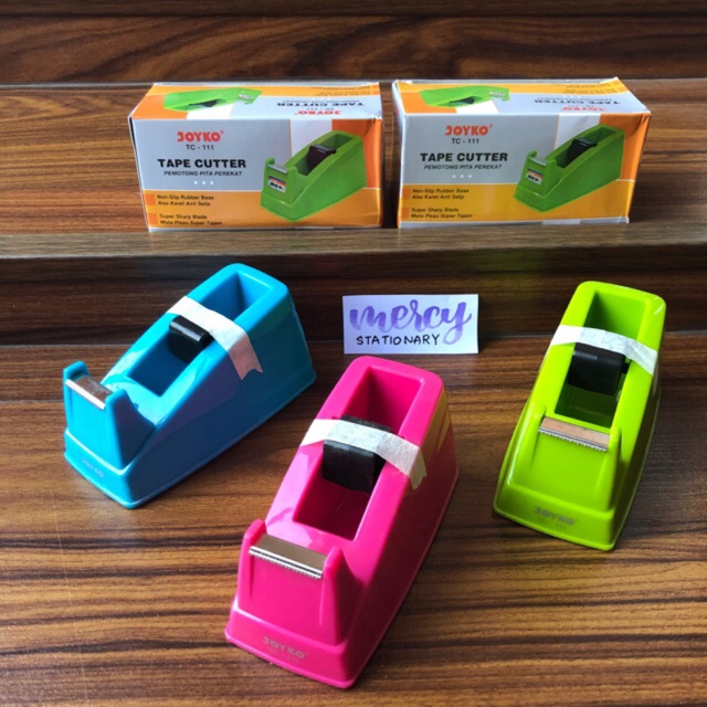 

Tape Cutter Joyko TC-111 Tape Dispenser Tempat Isolasi Kecil