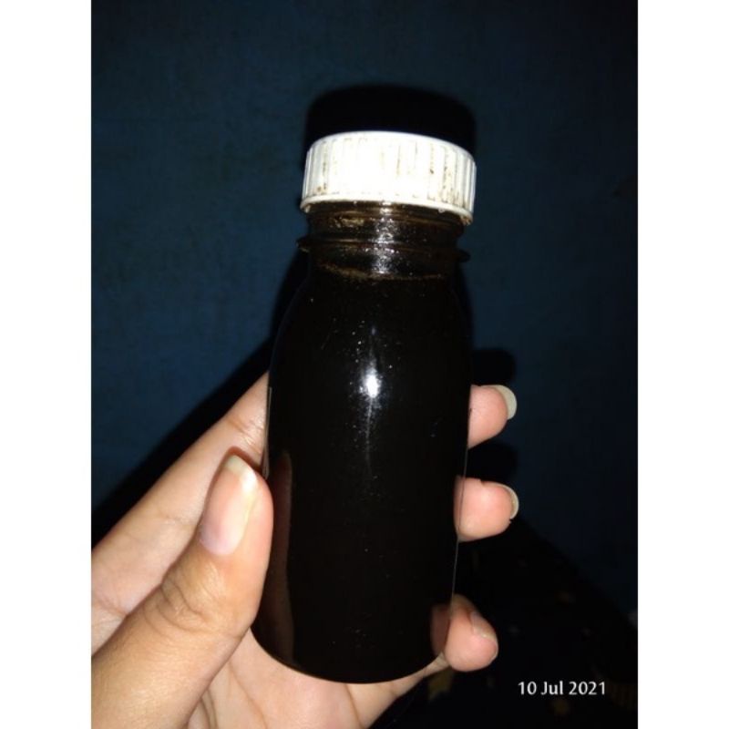 Minyak kelapa dan kemiri sangrai minyak penumbuh rambut minyak anti botak