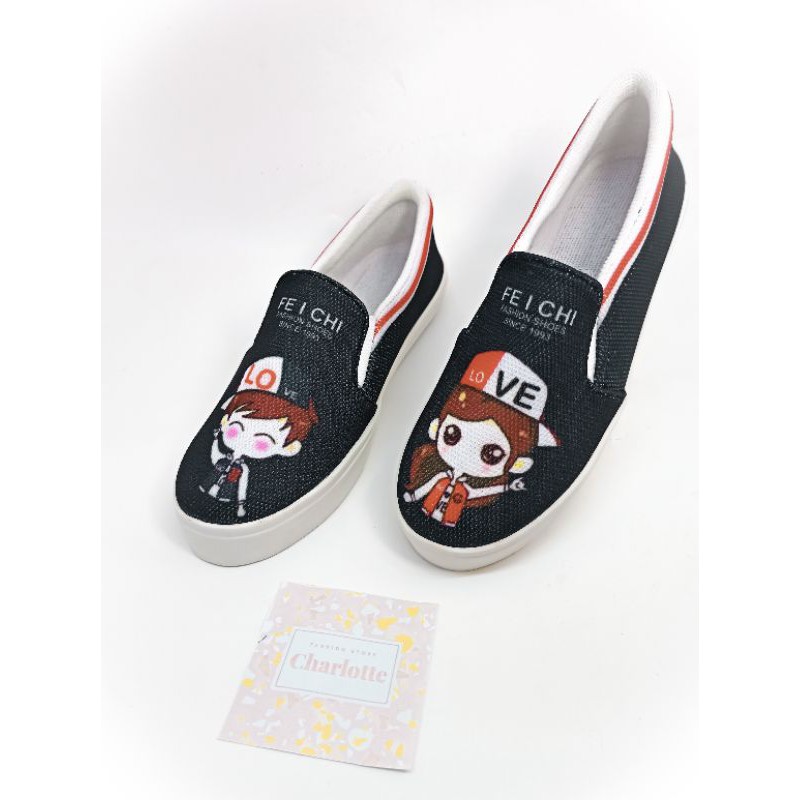 SEPATU WANITA SLIP ON KARAKTER LOVE BOY BEST SELLER MURAH WARNA HITAM DAN PUTIH UKURAN 36-40