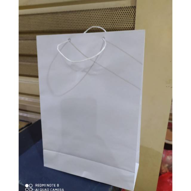 

Paper bag polio putih isi 12pcs terlaris dan termurah (25*35)