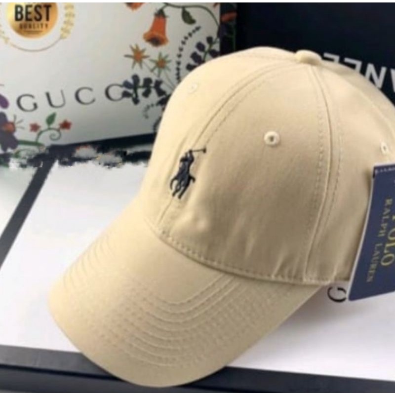 Topi polo hitam putih dan krem hitam.dengan gaya polo yg kecil imut simple & elegan.