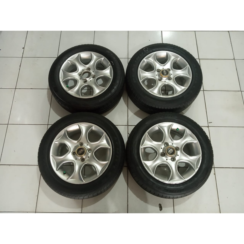 velg mobil bekas murah ring 14 lubang baut 4x100 plus ban ukuran 165 65 r14 kondisi 80%