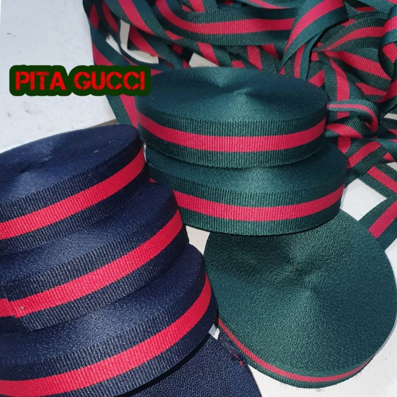 

Pita motif hijau Lebar 2,5cm Dijual Per Roll isi 20 yard