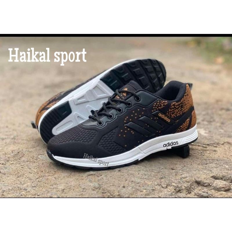 Sepatu sneaker olahraga pria terbaru sol karet