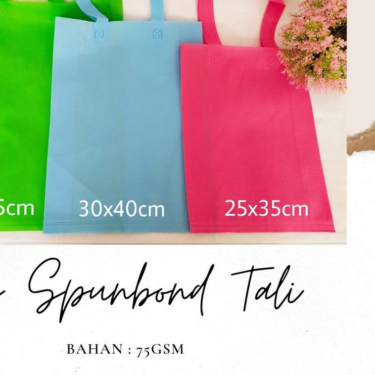 

✦ TAS KAIN SPONBOUND/ GOODIE BAG/ TAS PRESS TALI / TLS 38x45 Perlusin ➢