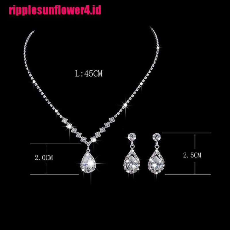 Set Kalung + Anting Gantung Vintage Bentuk Tetesan Air Kristal Warna Silver Untuk Wanita