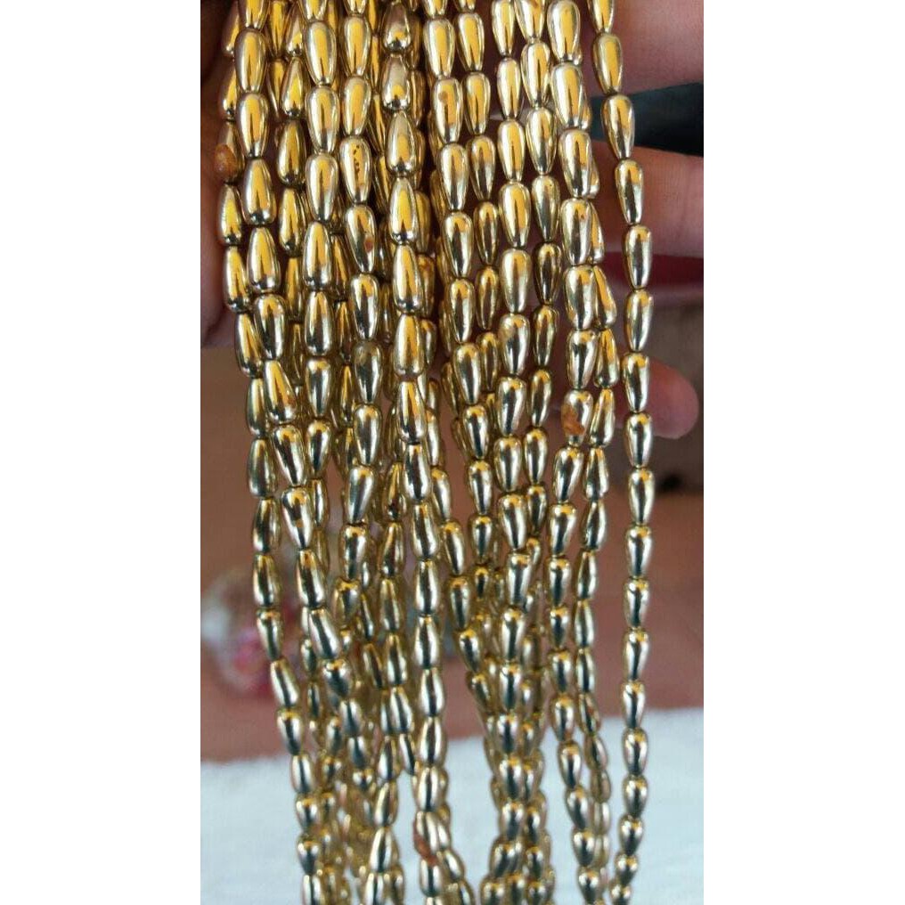 

Ini Manik Manik Plastik Tetes Air Gold 0,8 Cm ( 1 Renteng ) ( Das ) Original