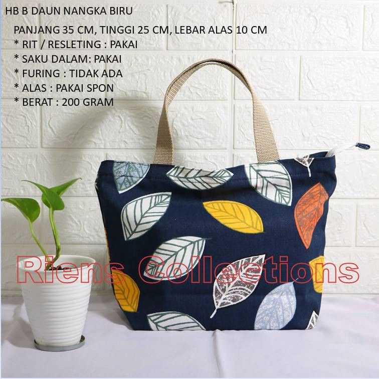 RIENS COLLECTIONS. HANDBAG BESAR BAHAN KANVAS MOTIF DAUN NANGKA BIRU