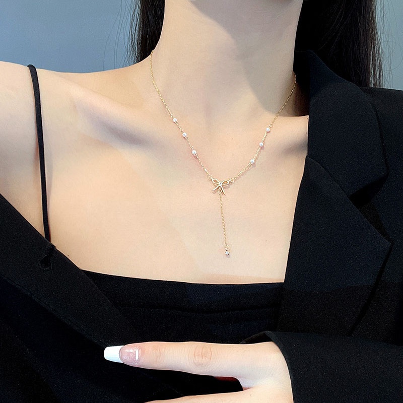 Kalung Choker Liontin Pita Bahan Titanium Aksen Mutiara Untuk Wanita