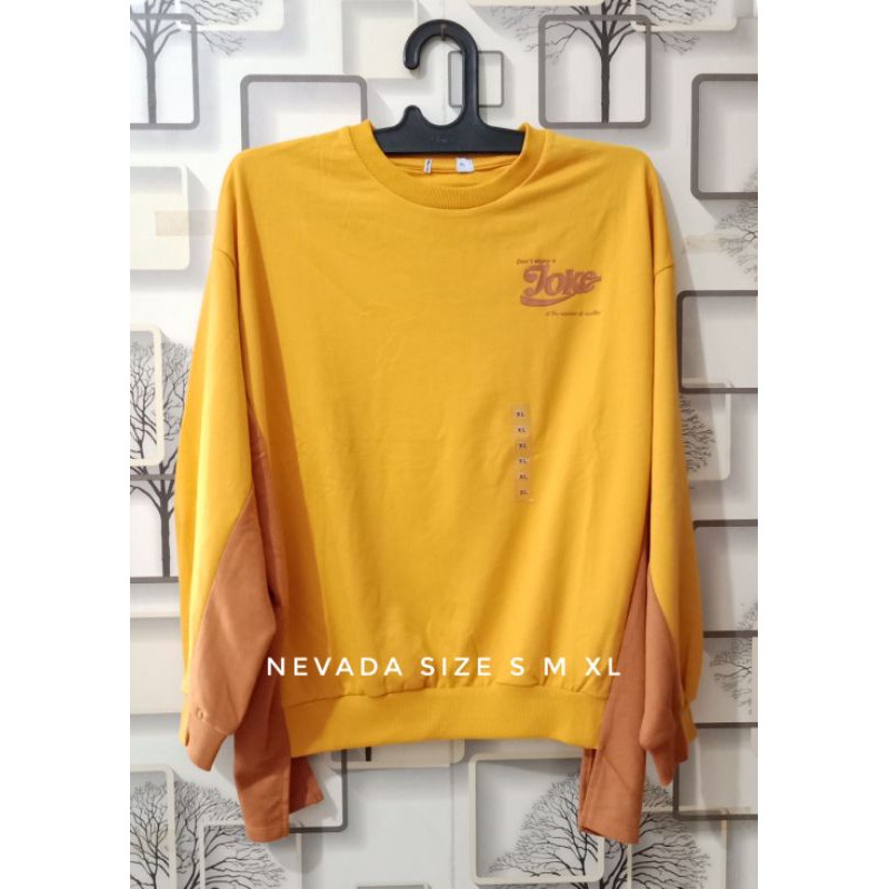 

Sweater nevada cutting label