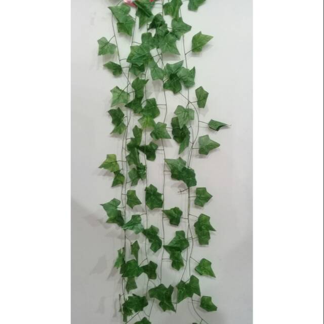 Dekorasi daun plastik