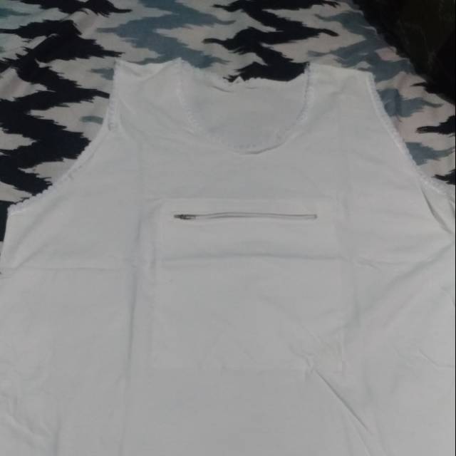 Kaos polos cewek berkantong doraemon
