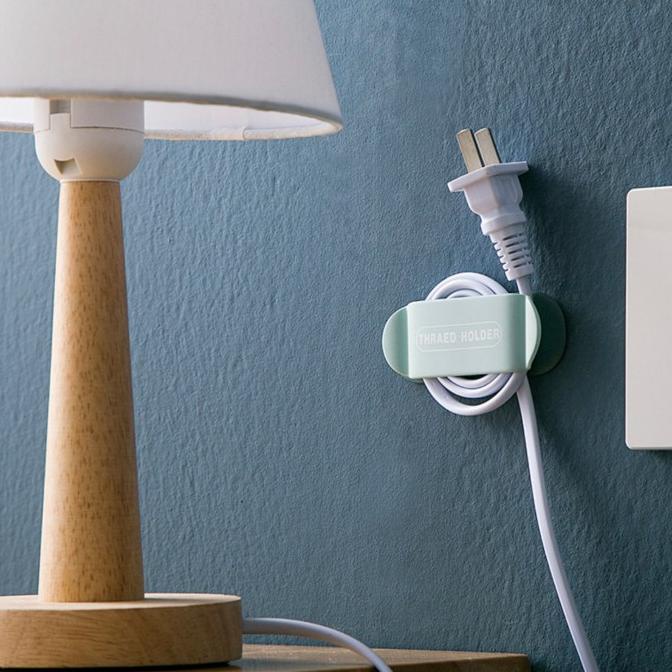 

Klip Kabel Organizer Pengaman Kabel Colokan Stop Kontak Double Tempel