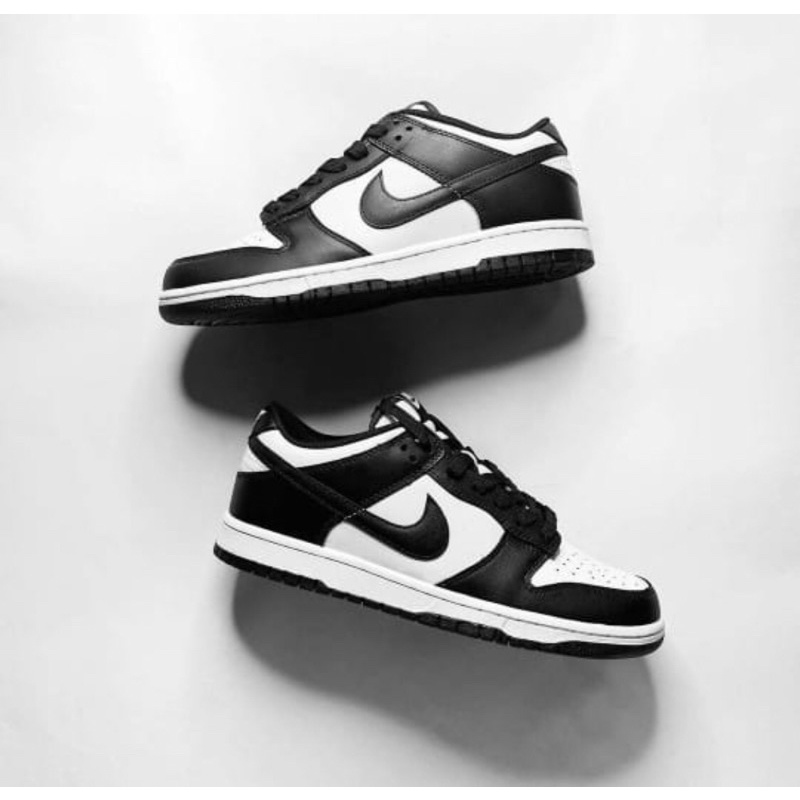 white and black low dunks