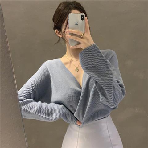 Korea feminin V-neck cross-exposed collarbone pit strip atasan sweater rajutan lengan panjang longga