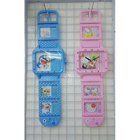 Promoo Murmer Jam Dinding Bentuk Jam Tangan Plus Frame Foto Doraemon Dan Hello Kitty   Merah Muda