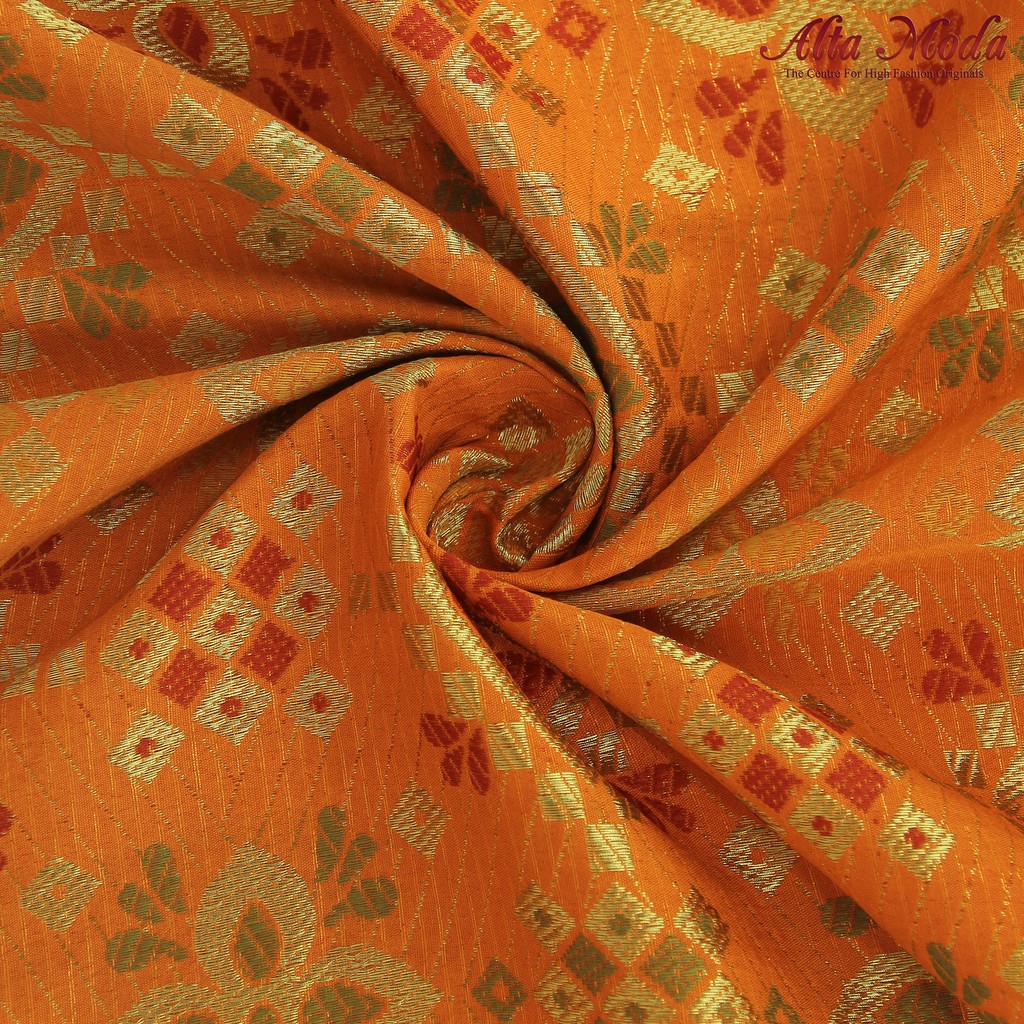 

Alta Moda Songket Motif Palembang Orange Terang Mix Benang Gold (1M)