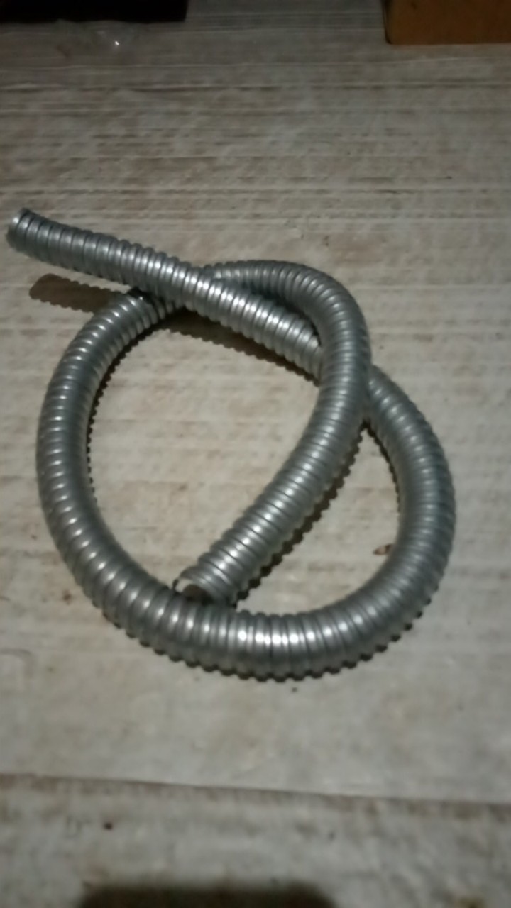 Pelindung Selang Gas Stainless Meteran Selongsong Selang