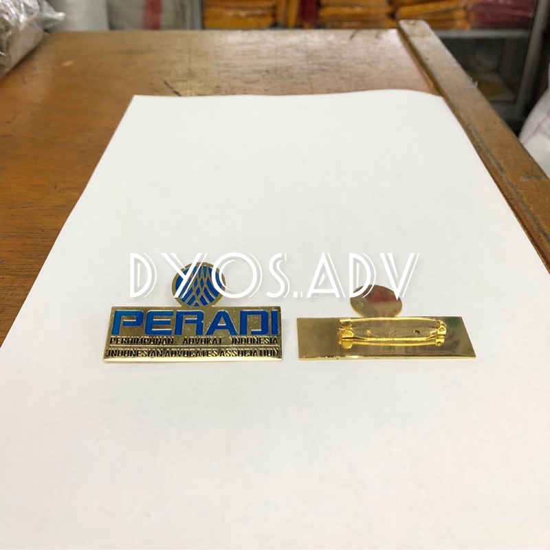 Pin peradi model baru