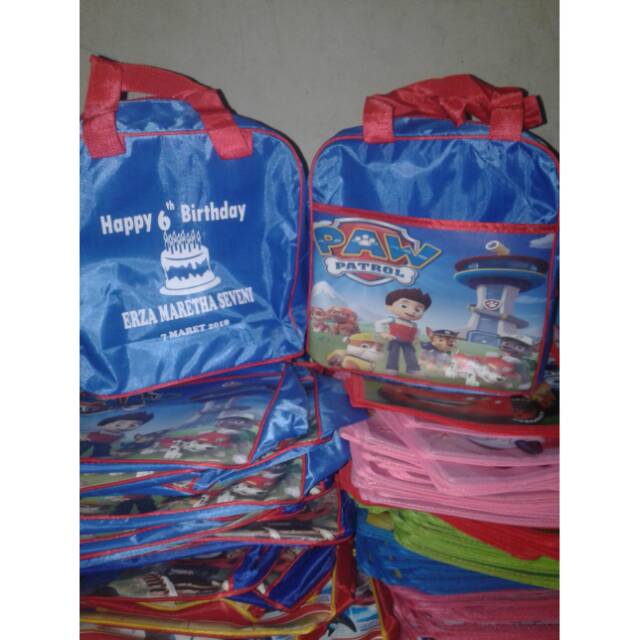 

Souvenir tas tenteng kitap kantong depan